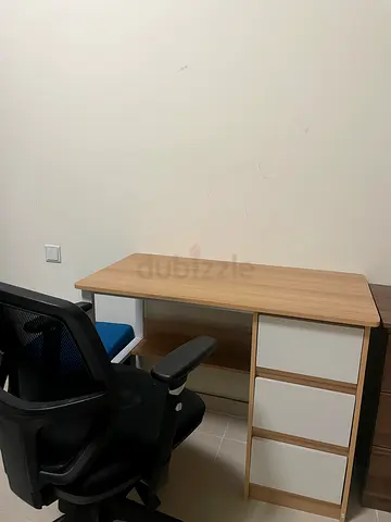 Light wood study desk with shelving and drawers