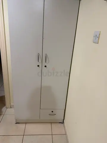 Tall white wardrobe / armoire with drawers - good condition