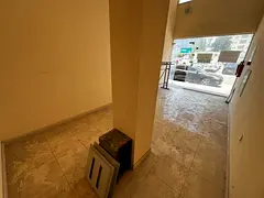 Shop in a prime location in Al Rashidiya 3, opposite Grand Mall. Annual rent available. Parking avai