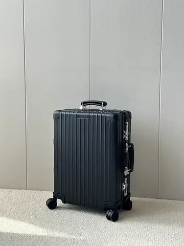 Rimowa Matte Black Hard-shell Roller Luggage - Carry-on Size