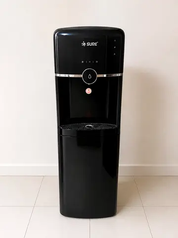 Black freestanding water dispenser / cooler - good condition but no cooling