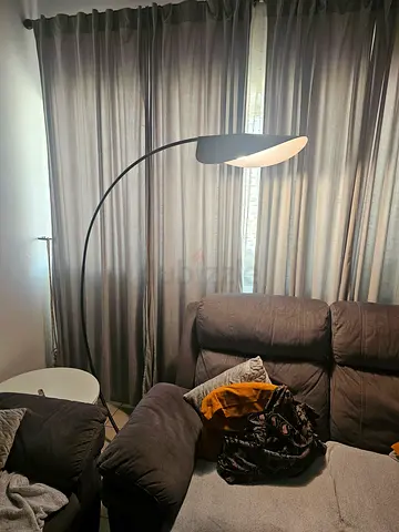 Tall black arc floor lamp with leaf-shaped shade - good condition
