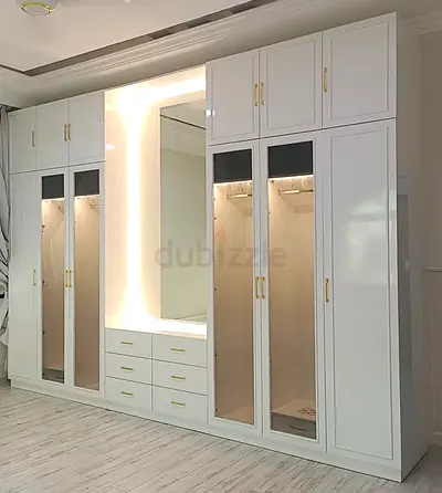 Built-in white wardrobe with lighted mirror and drawers - good condition