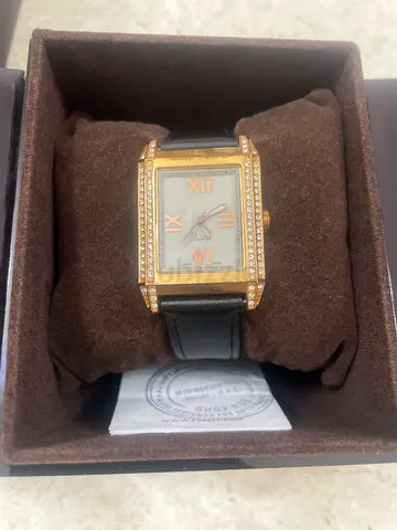 Esprit Swiss Ladies Rectangular Gold Tone Watch with Diamond Accent Leather Strap