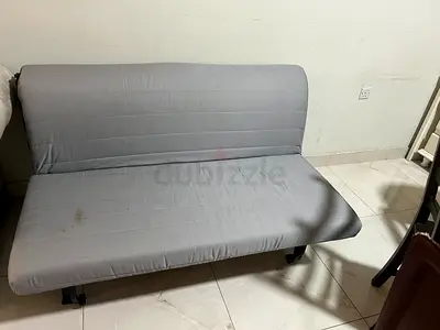 Simple grey fabric futon sofa bed - good for small spaces