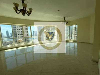 Beautiful 2BR apartment in Al Khan with free AC, free parking, gym, pool, and a private garden, overlooking Al Majaz Waterfront in a prime location.