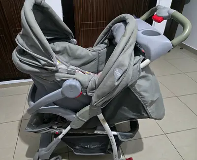 Light grey travel system stroller with infant car seat - good condition