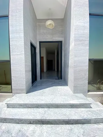 : **"A luxurious villa with excellent and luxurious finishes in an important strategic location and a spacious area."**