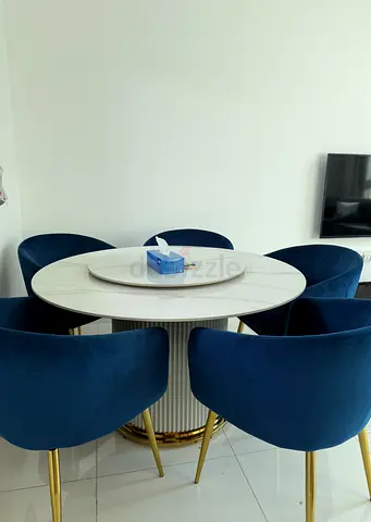 Round Marble-Top Dining Table with 8 Navy Velvet Chairs