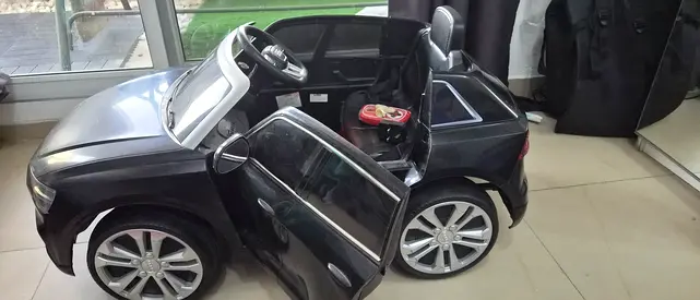 Battery-Powered Kids Ride-On Car (Black) - Good Condition