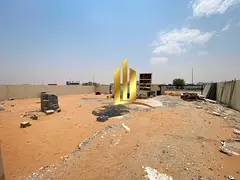 Two fenced yards for rent in Sajaa Industrial Area, Sharjah.