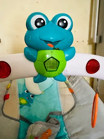 baby bouncer with toy bar with music and vibration