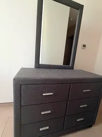 Grey upholstered dresser with mirror, 6 drawers