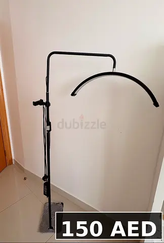 Black adjustable arc floor lamp - modern design, working condition