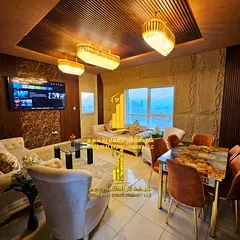 Luxury two-bedroom apartment with a living room in Ajman - Al Rashidiya 1 - Orient Towers - furnishe