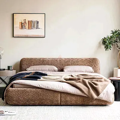 Upholstered double bed with plush boucle fabric - gently used