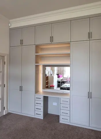 Built-in wardrobe with vanity and overhead storage - neutral grey