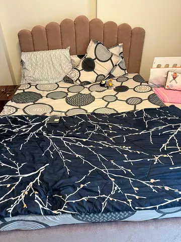 Queen bed frame with mattress and bedding - good condition