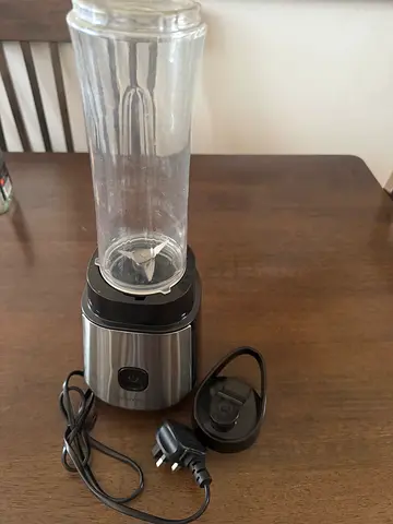 Personal stainless steel blender with travel bottle - used