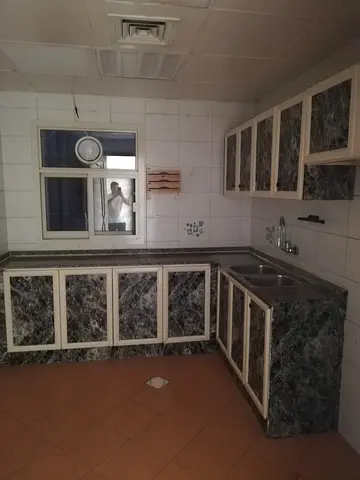 Excellent one-bedroom apartment with a living room in Abu Shagara for 25,000.