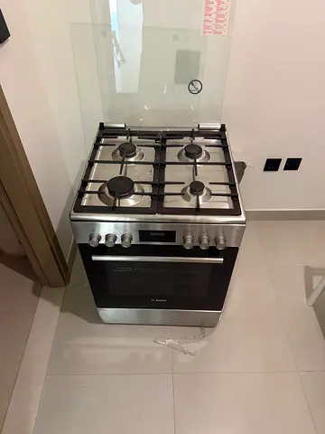 Stainless Steel 4-Burner Gas Range with  electric Oven -very Good Condition