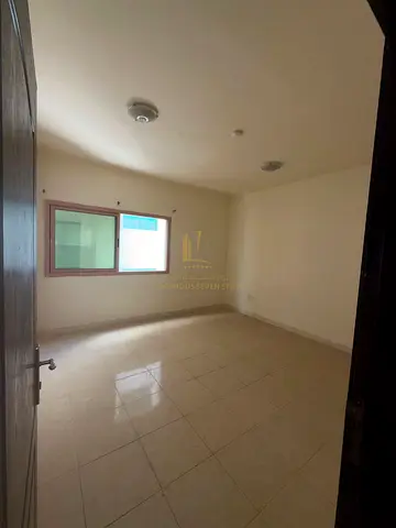 🏡 للإيجار السنوي | شقة غرفتين وصالة في برج اللوتس – القاسمية