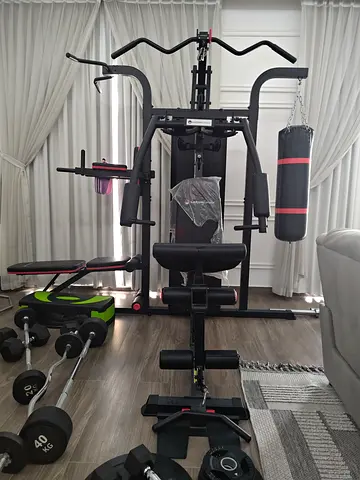 Multi-Function Home Gym Station with Dumbbells and Punching Bag