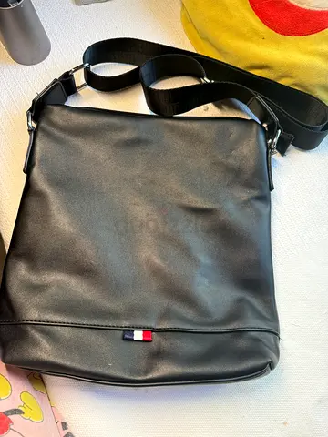 Black leather crossbody messenger bag with adjustable strap for men