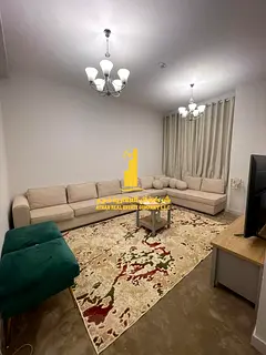 Luxury apartment, second occupancy, one bedroom and living room with a balcony and open view. Ajman,