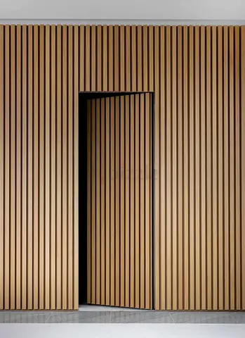 Custom Wooden Slatted Wall Panel with Concealed Door