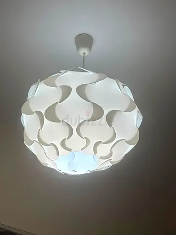 IKEA. 3. Modern white pendant ceiling lamp - decorative spherical design