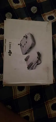 لقطة للبيع: درون DJI Mini 2 Fly More Combo كاملة 4K بحالة الوكالة