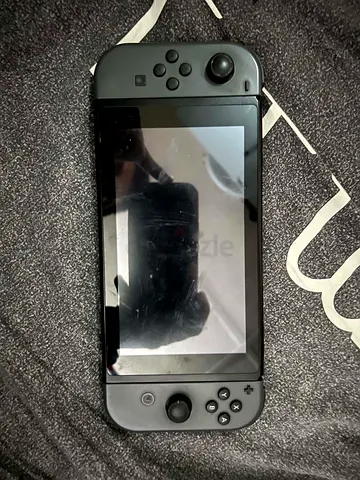 Nintendo Switch console with Joy-Con controllers - used, good condition