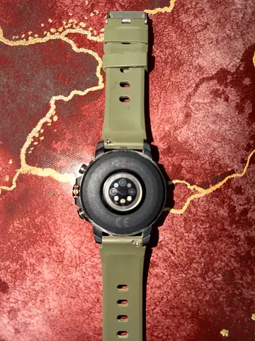 Used digital sport wristwatch with green silicone strap - working condition