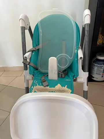 Used baby high chair with tray and harness - teal