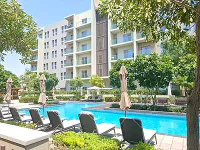 Like a brand new 1 bedroom big hall with private garden and pool only 55k in al zahia Community