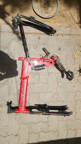 Used mountain bike frame with two wheels (for parts)