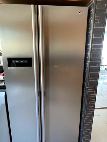LG Side-by-Side Stainless Steel Refrigerator - Good Condition