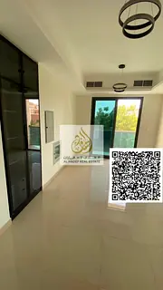 Two-bedroom apartment with a living room in Al Hamidiya—first-time occupancy. Features 2 bathrooms