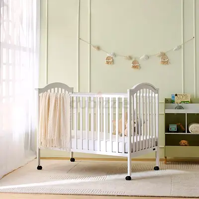 Juniors like new White Wooden Baby Crib with Wheels - Good Condition