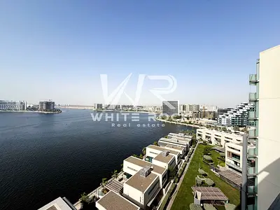 2BR with Laundry Room | Prime Waterfront Living