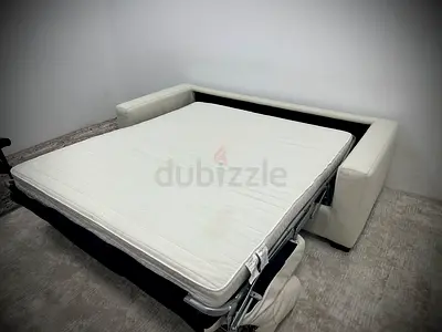 Like new condition Natuzzi sofa bed