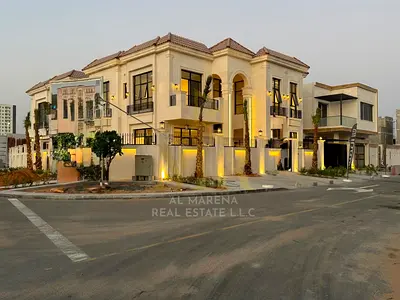 Luxury villa in one of Ajman's most prestigious areas, featuring a private pool, electricity, water, and air conditioning included, for a truly upscal