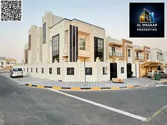 A luxurious two-story corner villa with a rooftop terrace and spacious yard, featuring four master b