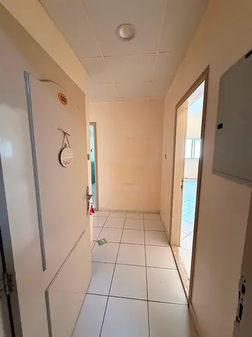 Annual rental apartment in Al Majaz 3 near the park, 2 bedrooms, 2 living rooms, 2 bathrooms, balcony, spacious layout, AED 42,000 including attestati