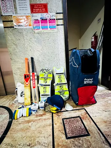 Cricket equipment set - bats, pads, gloves, helmet and kit bag (used)
