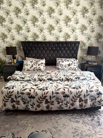 King size bed frame with tufted headboard and mattress set