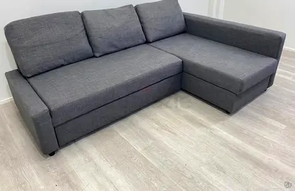 Grey L-shaped corner sofa bed