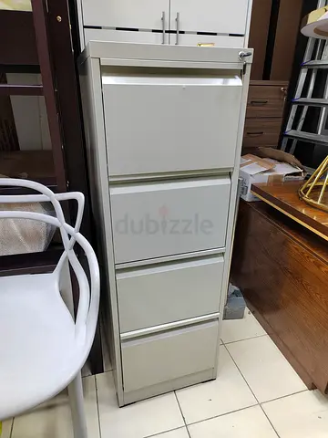 Beige 4-Drawer Metal Filing Cabinet - Good Condition