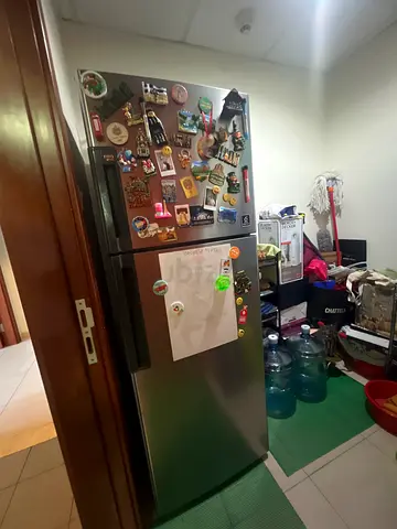 Stainless steel refrigerator with freezer - great working condition